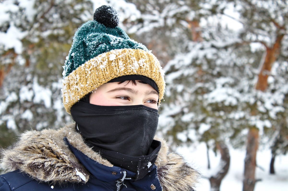 woman wearing Balaclava in cold weather to cover face