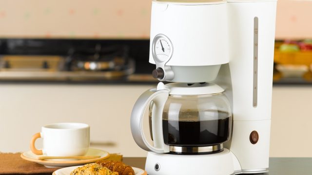 Coffee maker with croissant