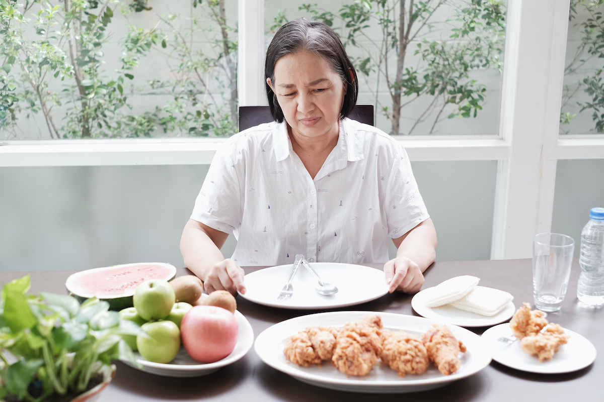 senior asian woman not eating
