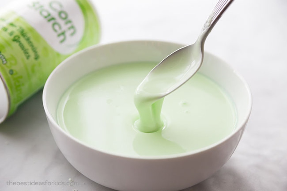 spoon in bowl of green oobleck