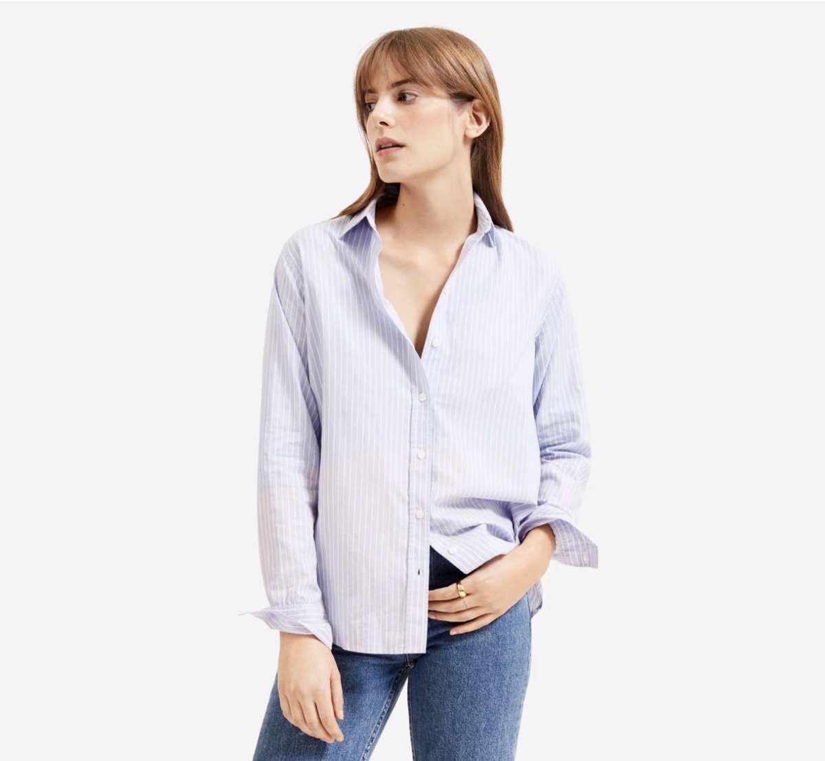 white woman wearing purple button up shirt