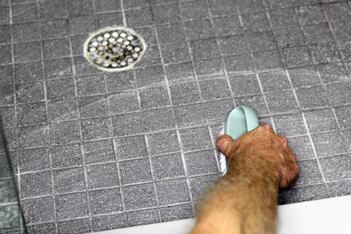 Cleaning scrubbing shower floor