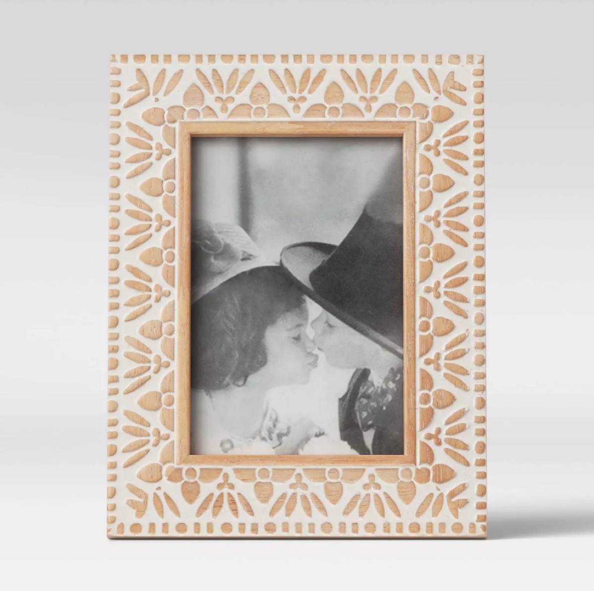 engraved wooden picture frame with black and white photo