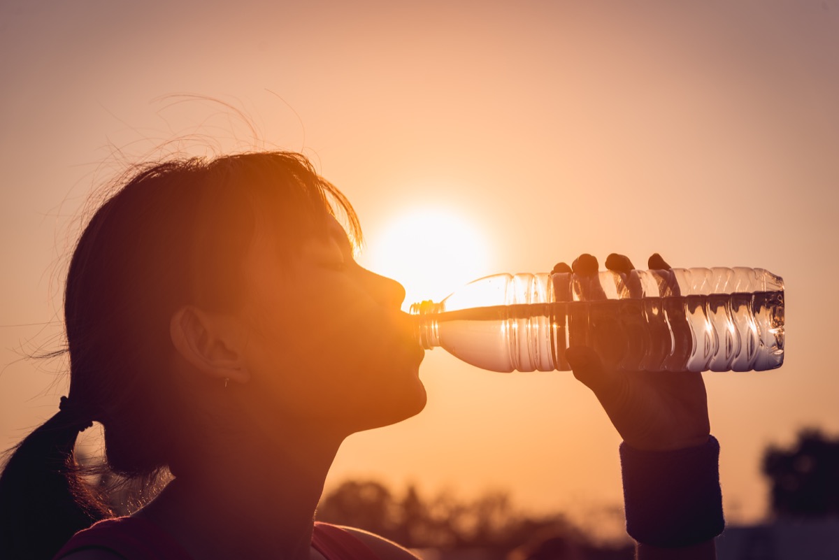 Woman drinking water bottle