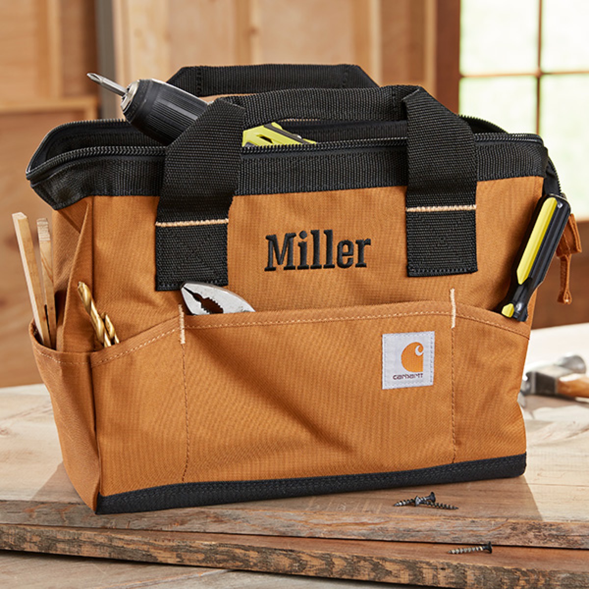 tool bag with "Miller" embroidered
