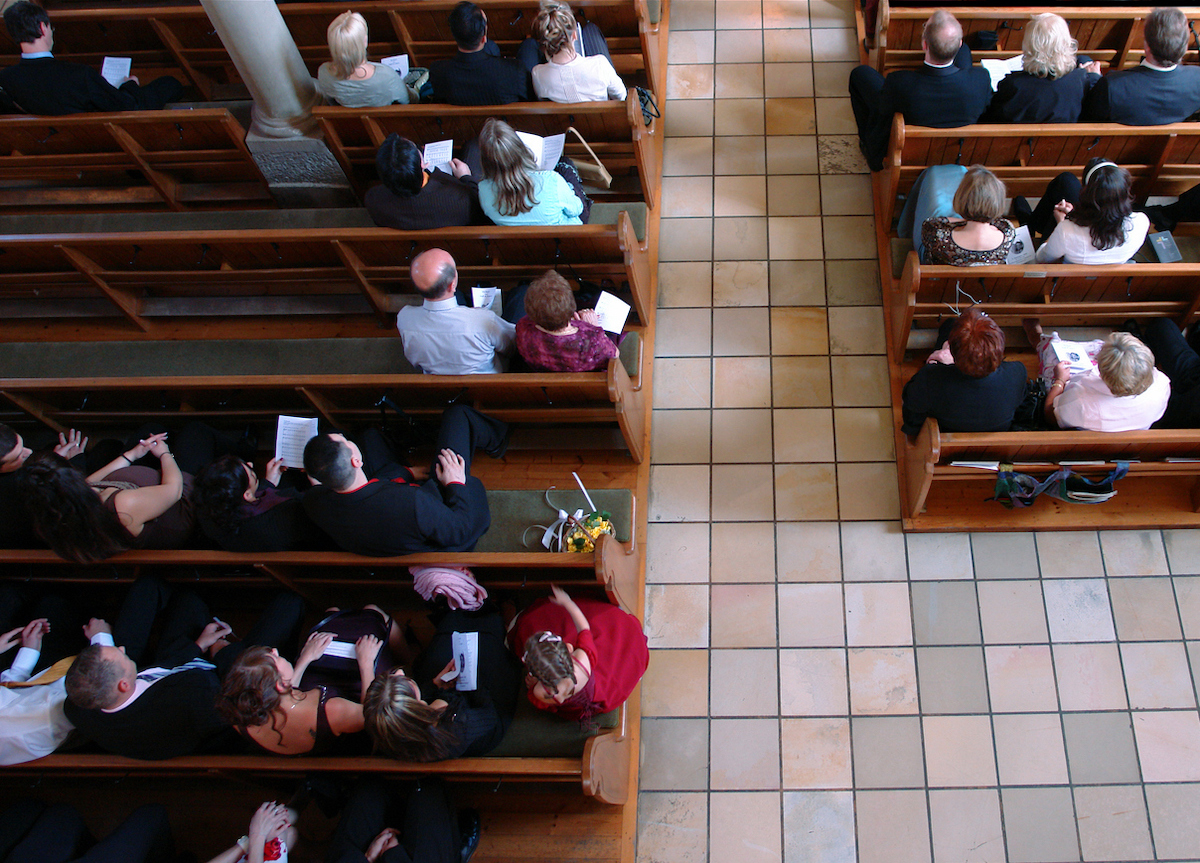 Congregation at church praying
