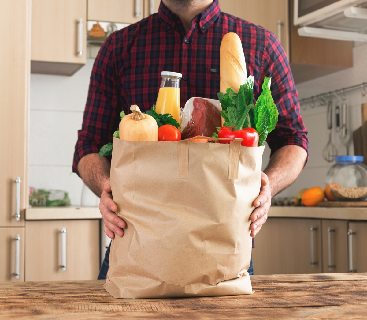 Man holding grocery bag
