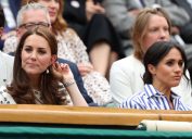 Kate (Catherine Middleton) Duchess of Cambridge and Meghan Markle, Duchess of Sussex at Wimbledon in 2018