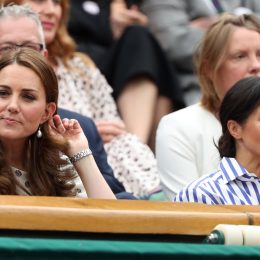 Kate (Catherine Middleton) Duchess of Cambridge and Meghan Markle, Duchess of Sussex at Wimbledon in 2018