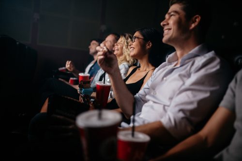 people watching a movie in a movie theater
