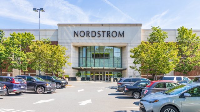 CHARLOTTE, NC, USA-28 July 19: Entrance to Nordstrom Department store, with crowded parking lot on a sunny summer day. (CHARLOTTE, NC, USA-28 July 19: Entrance to Nordstrom Department store, with crowded parking lot on a sunny summer day., ASCII, 119