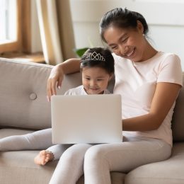 Parent and child on laptop