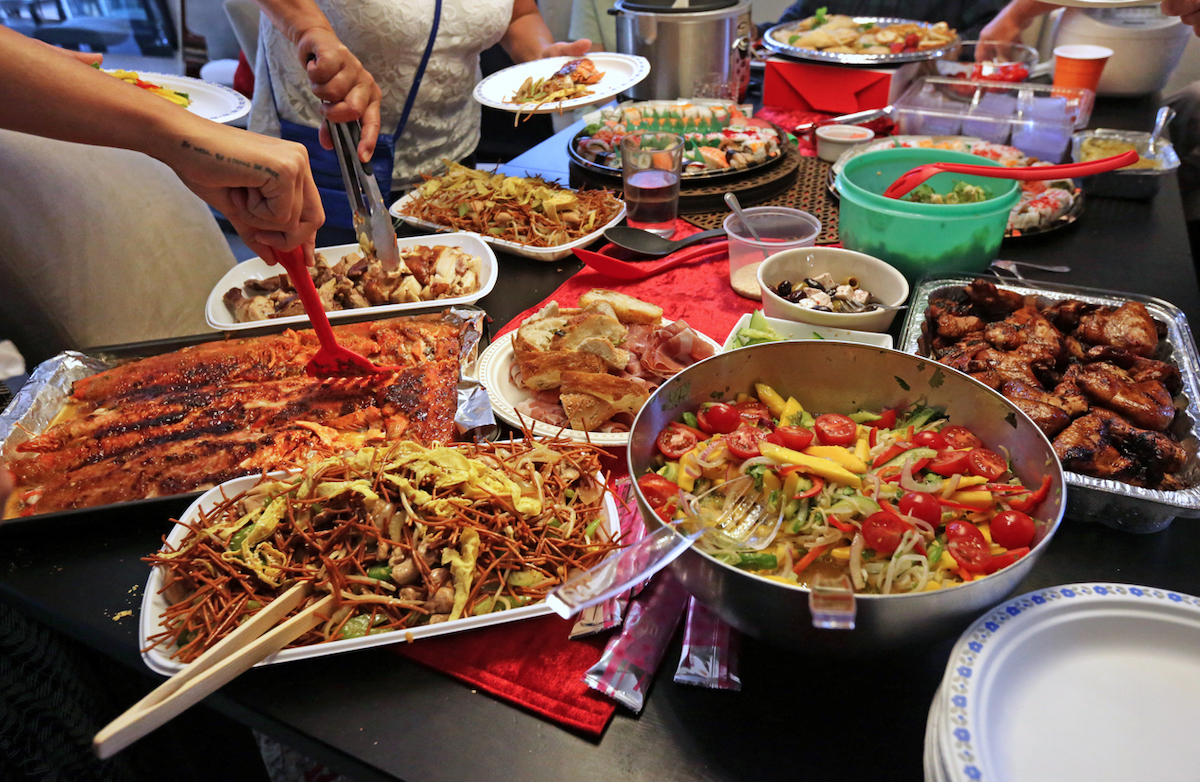 closeup of assortment of food at a potluck