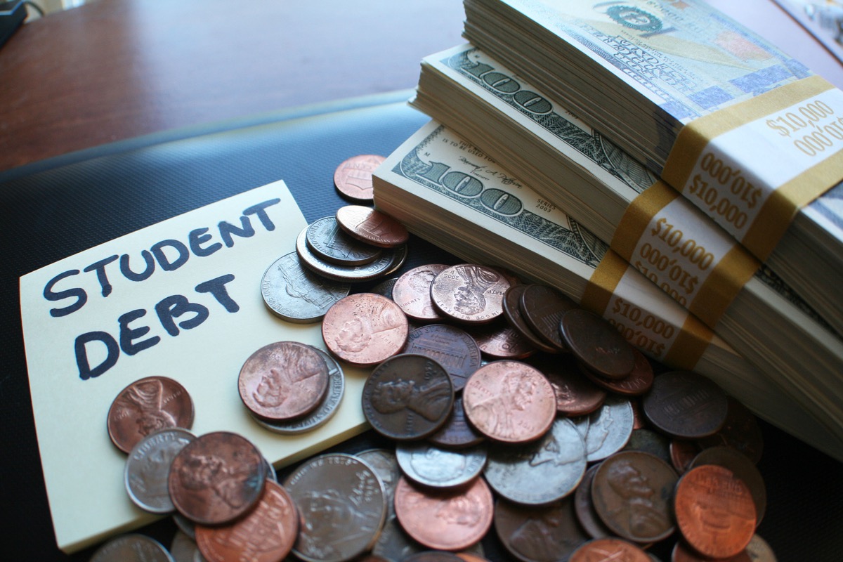 Cash, and a post-it that says "student debt"