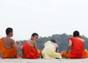 men sitting down from behind in thailand