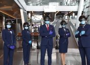 security team wears thermal scanning helmets at an airport