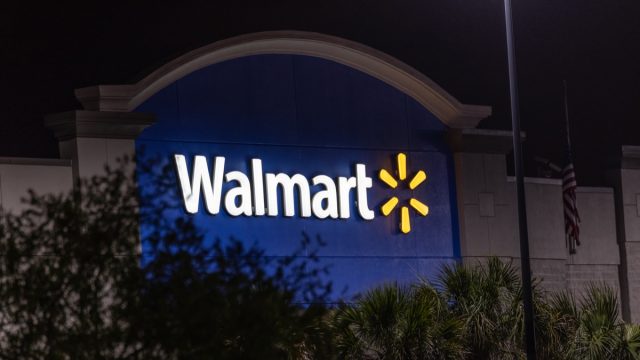 walmart sign on store exterior at night