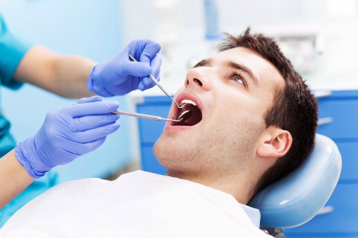 Man having dental work done