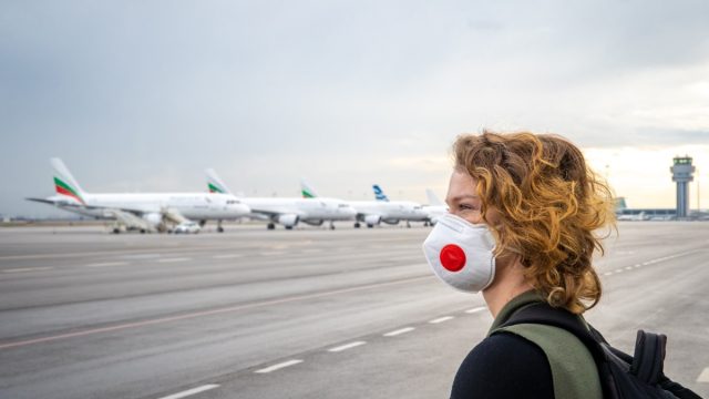 Masked woman at airport