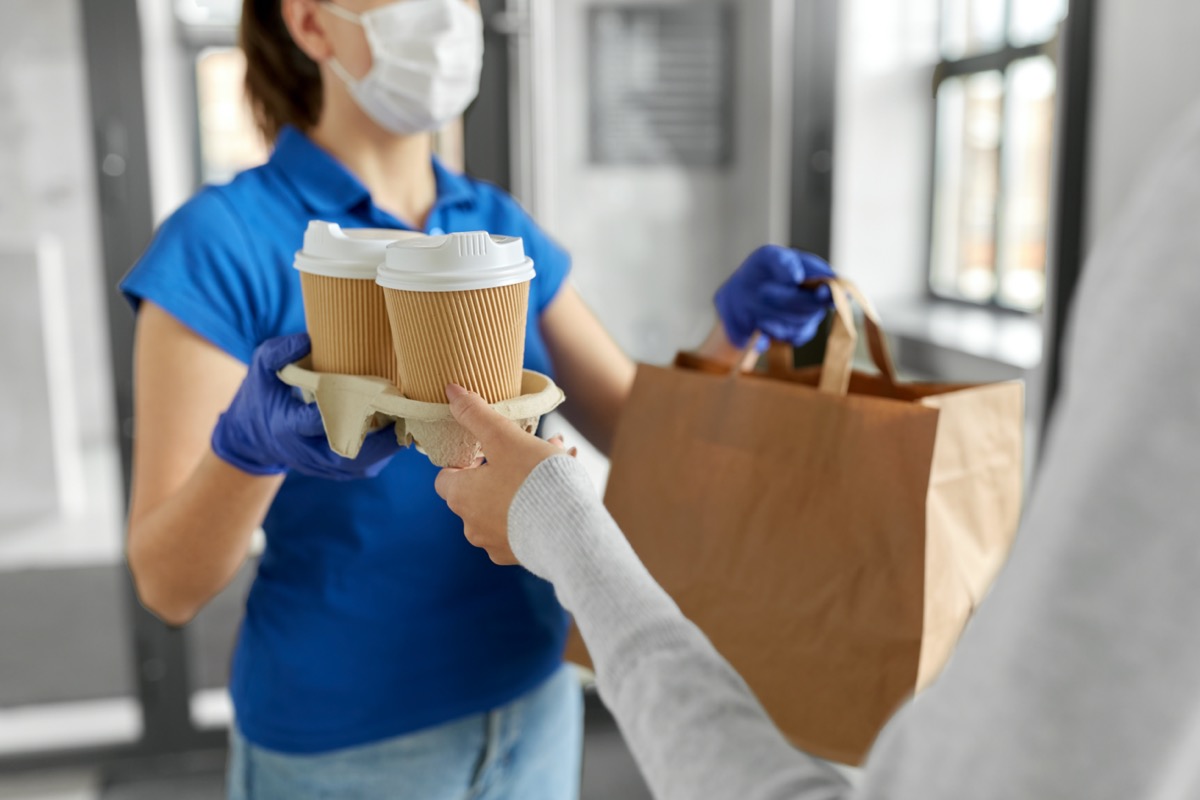 Woman delivering coffee and food