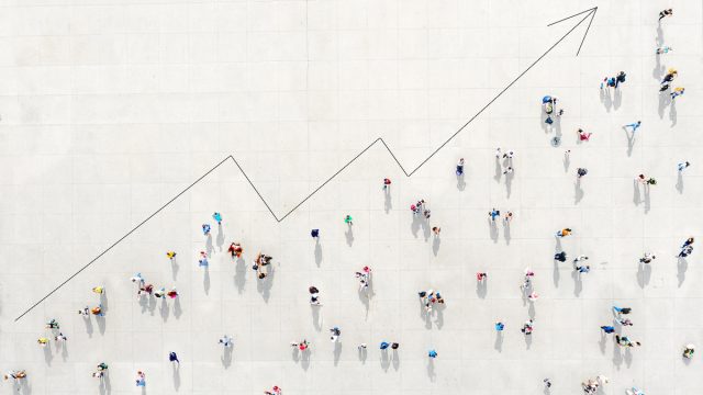 Crowd from above forming a growth graph