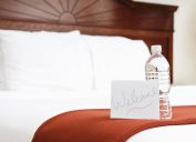 Hotel room with water as a welcome gift