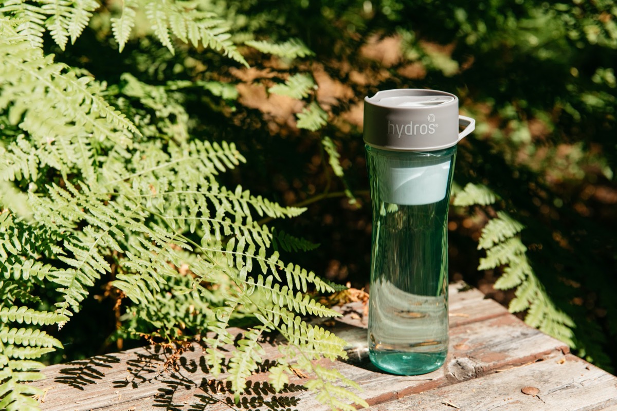 green hydros water bottle outdoors