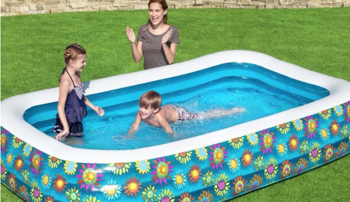 mom and kids in inflatable pool