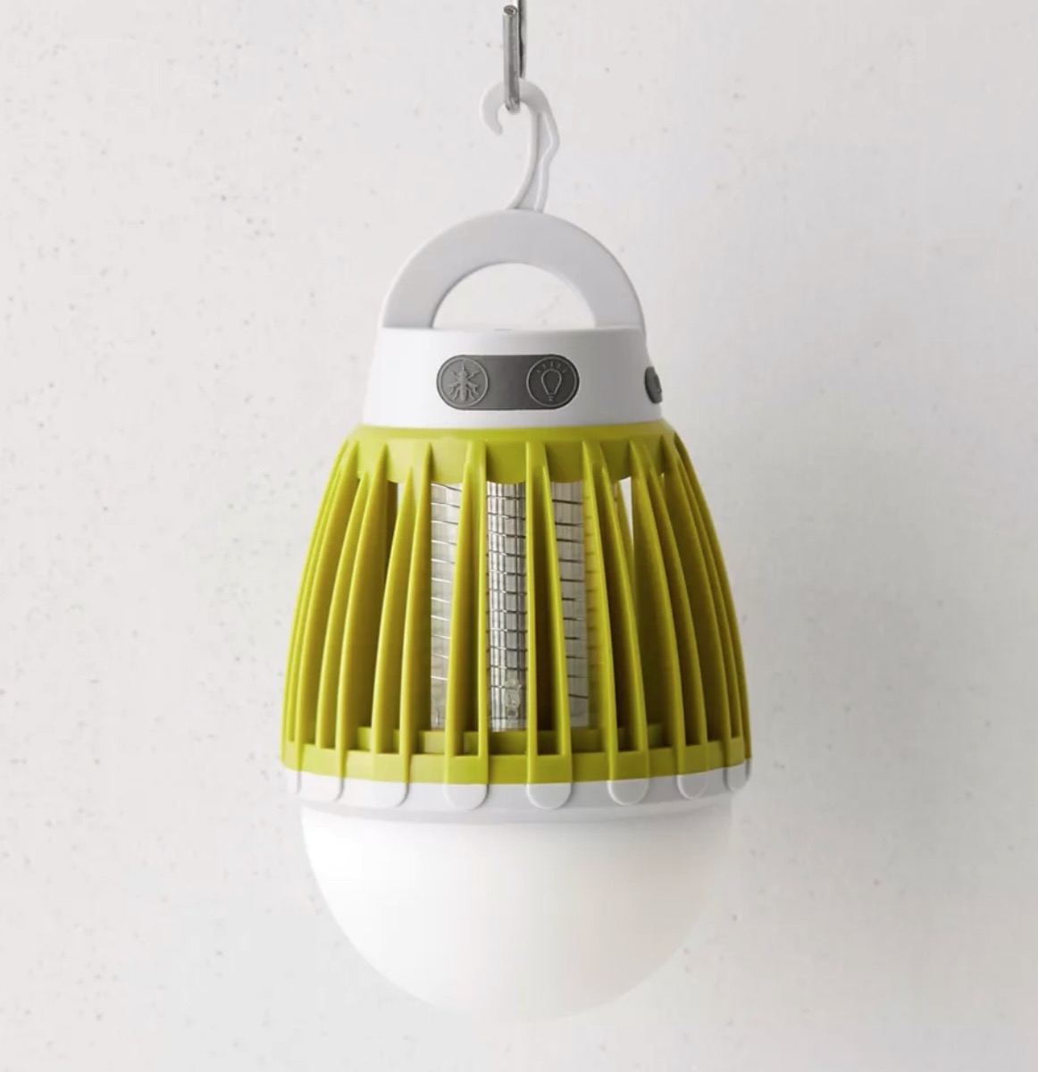 green and white hanging bug zapper