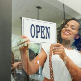 young black woman opening business