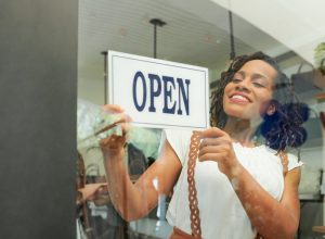 young black woman opening business