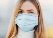 Young woman wearing medical mask