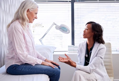 Woman talking to her doctor