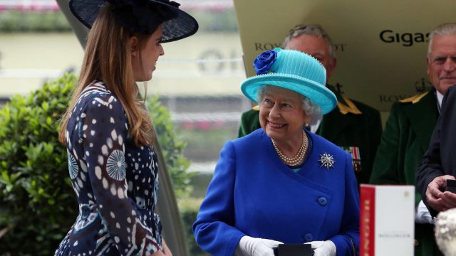 Princess Beatrice with Queen Elizabeth II after the Queens horse horse Dartmouth won the Hardwicke stakes during day five of Royal Ascot 2016, at Ascot Racecourse.