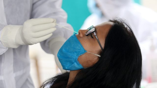 Indian woman coronavirus test