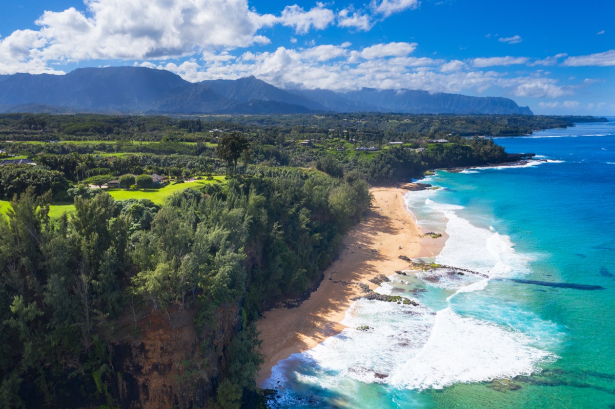 Secret beach also known as Kauapea beach is a stunning trail only accessible beach on the island of Kauai in Hawaii.