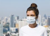 Woman wearing a mask outside during the coronavirus pandemic