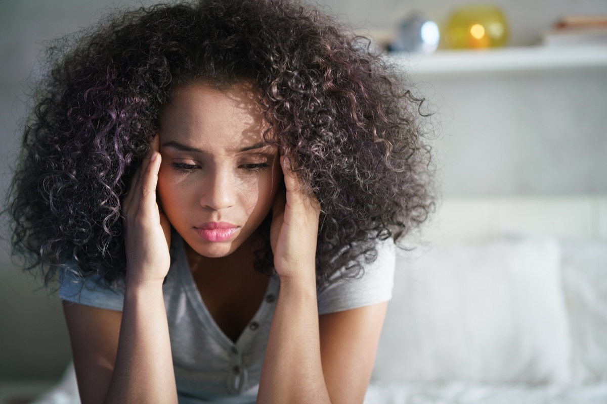 Woman with a PMS headache