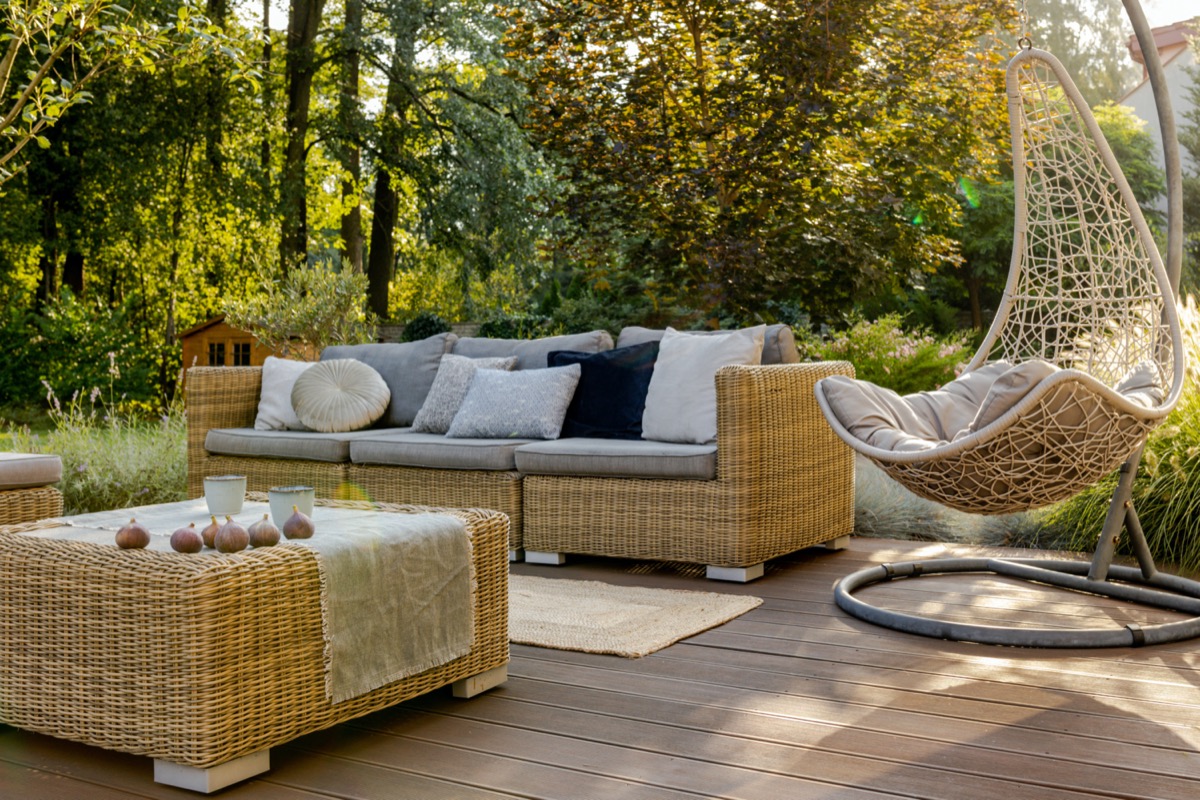 modern outdoor wicker or rattan furniture set up on patio
