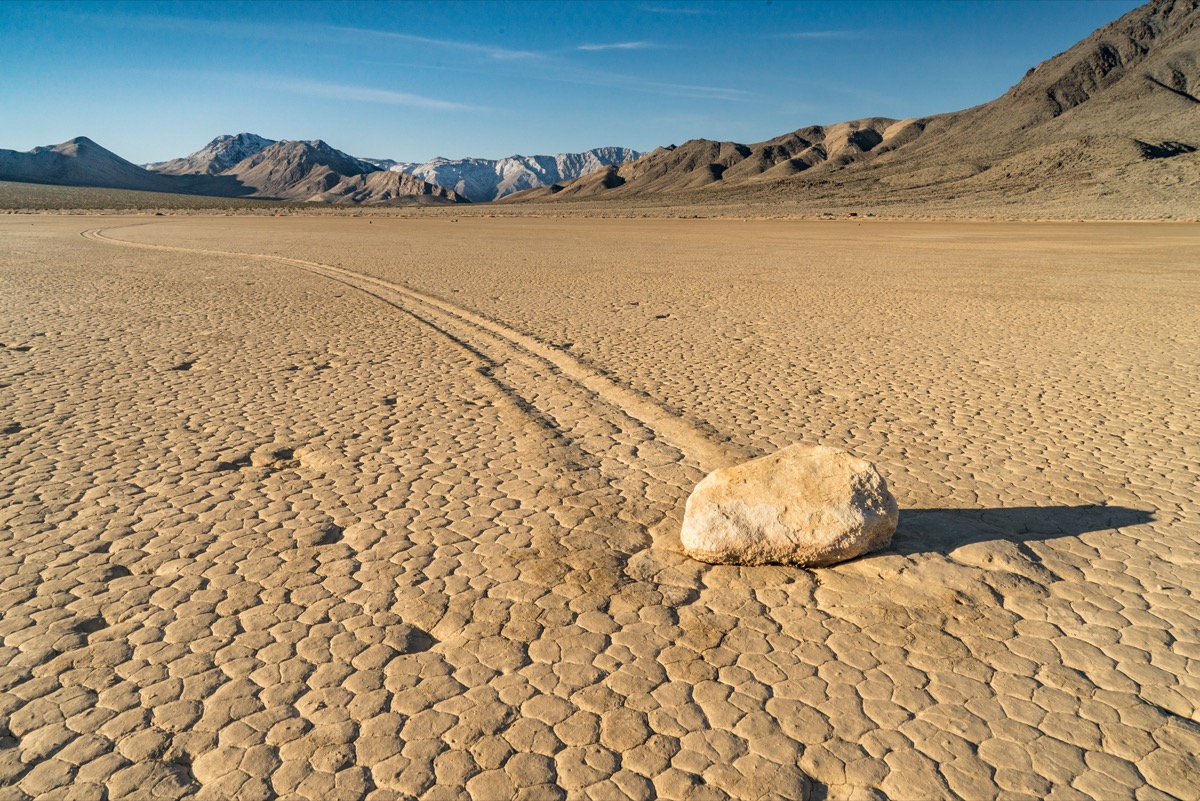 The Racetrack Playa is a scenic dry lake located above the northwestern side of Death Valley, in Death Valley National Park, Inyo County, California with "sailing stones" that inscribe linear tracks along the lake bed.