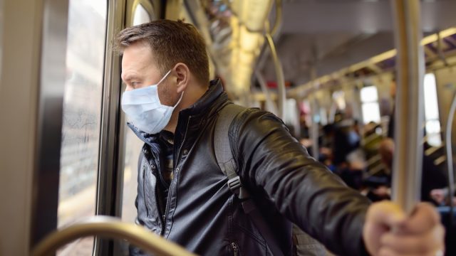 Man wearing a mask the subway
