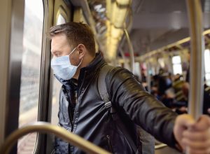 Man wearing a mask the subway