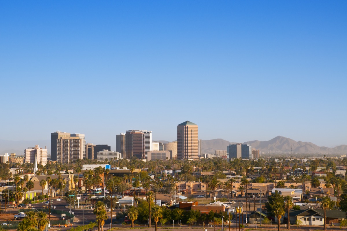 "Downtown Scottsdale and suburbs of Phoenix, Arizona, with the White Tank Mountain Range in the background in eerly morning lightMore images from Phoenix:"