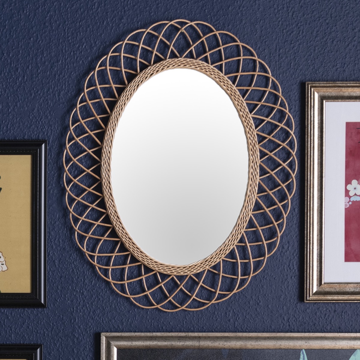 Drew Barrymore Collection rattan mirror on wall