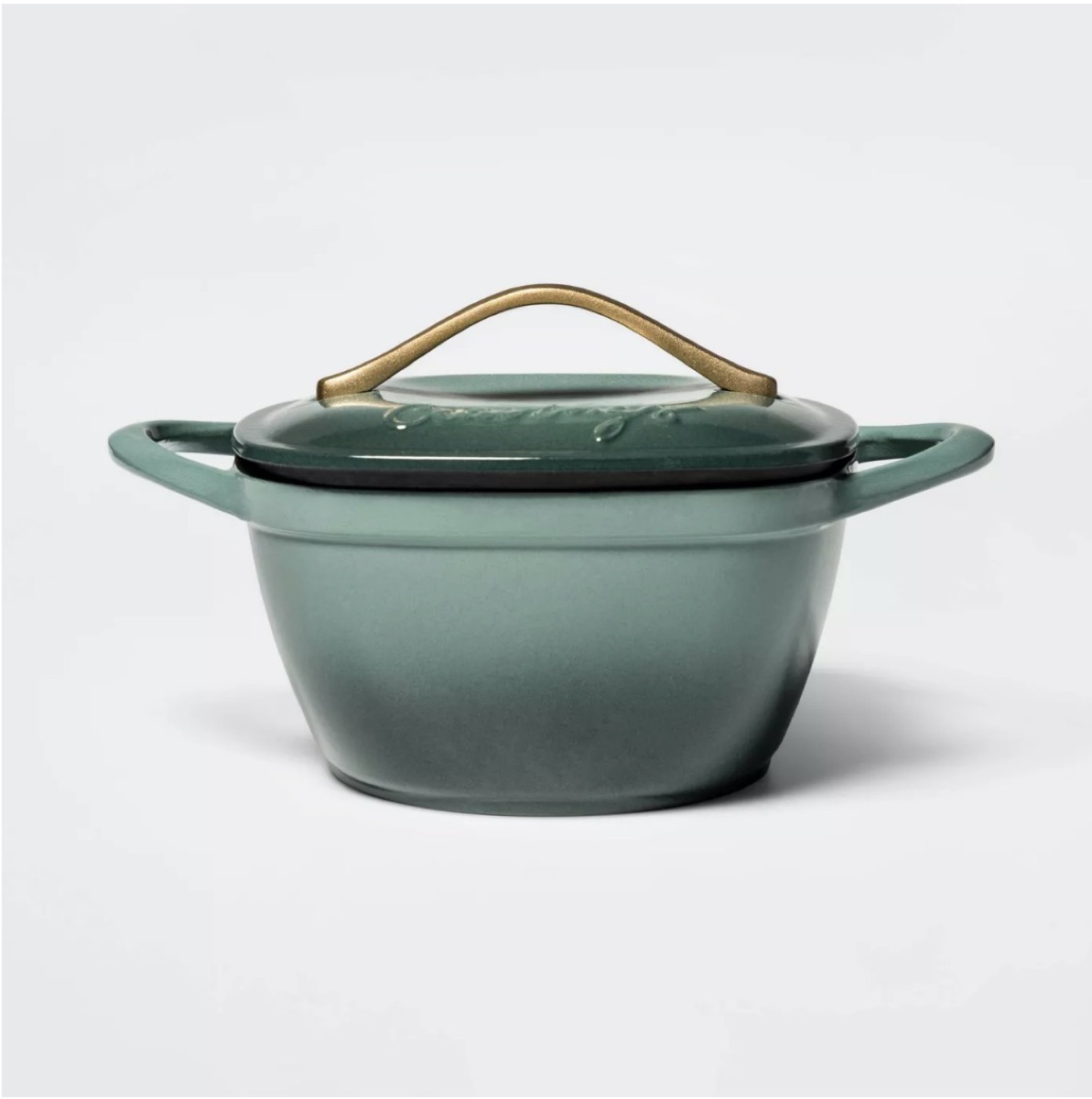 green dutch oven with handle