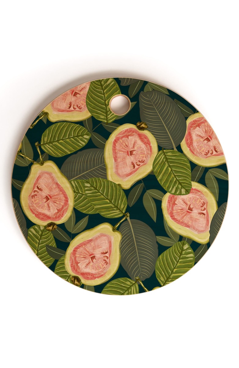green round cutting board with guava print