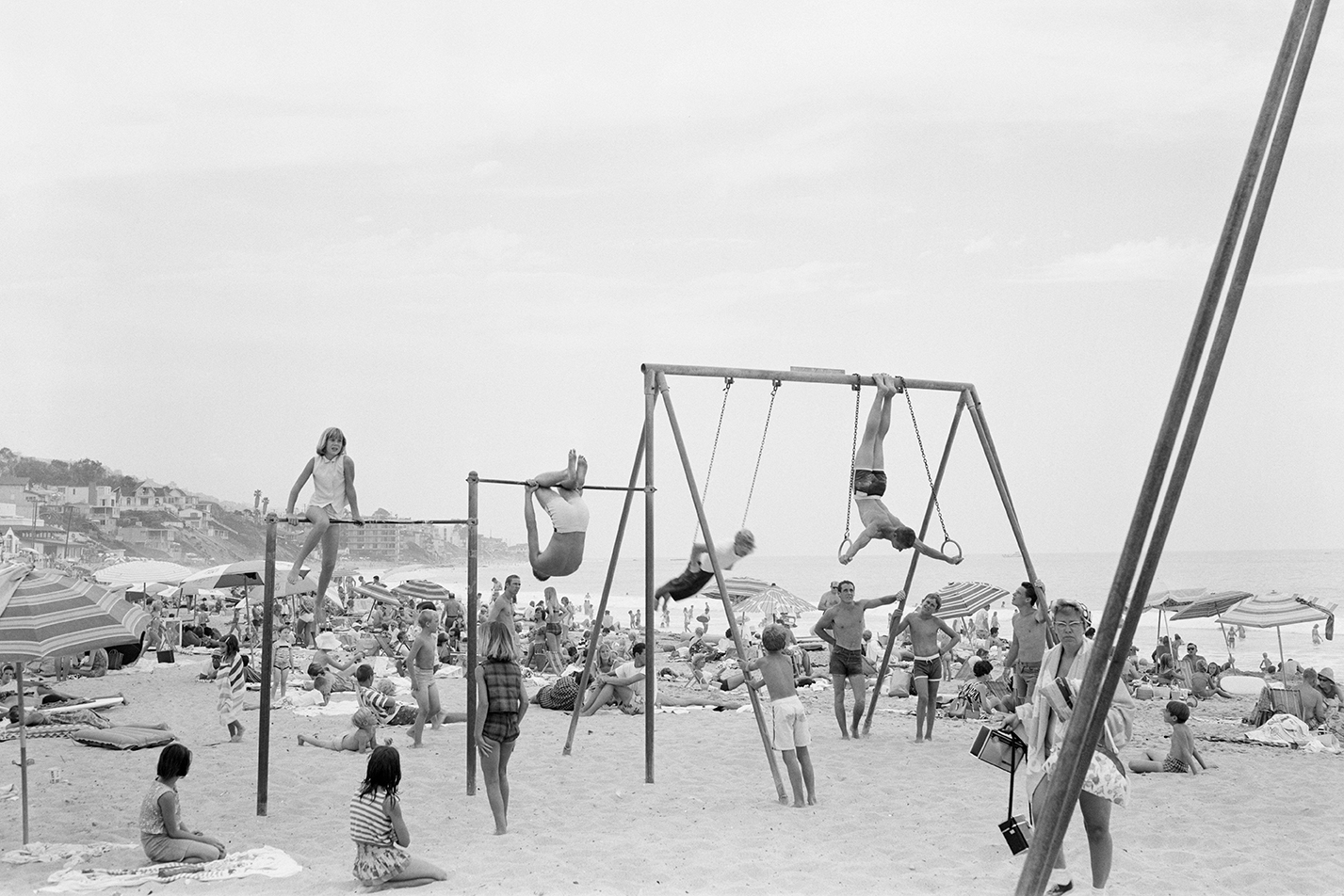 kids do gymnastics at the beach