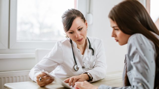 Woman talking with her doctor