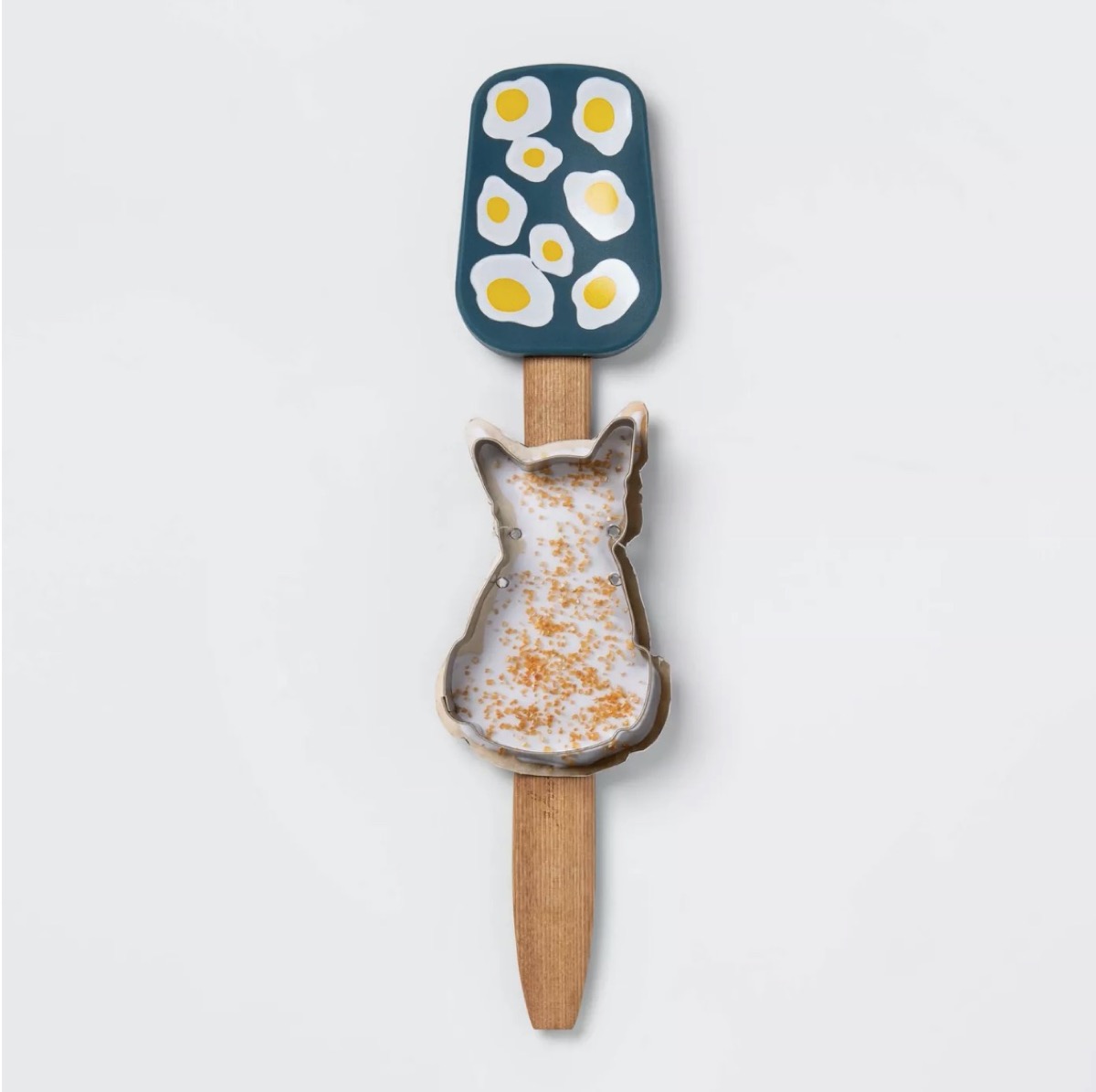 blue spatula with cat-shaped cookie cutter in handle