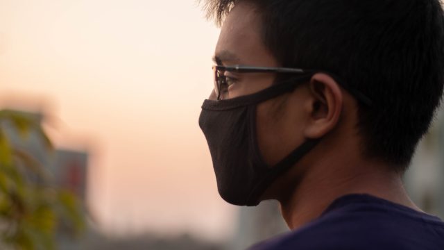Man wearing a face mask outside during the coronavirus pandemic